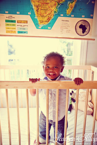 Playing in his crib